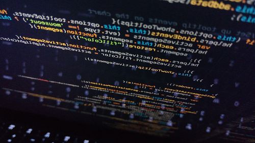 turned on computer monitor displaying coding application